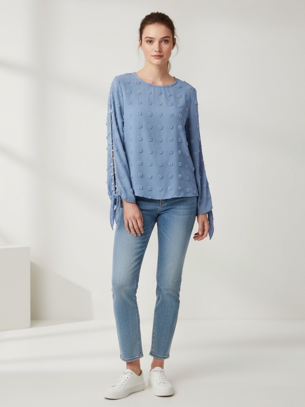Light Blue Textured Tie-Sleeve Blouse with Pearls down the sleeves.